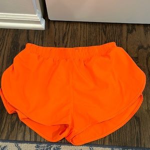 Neon orange running shorts size M